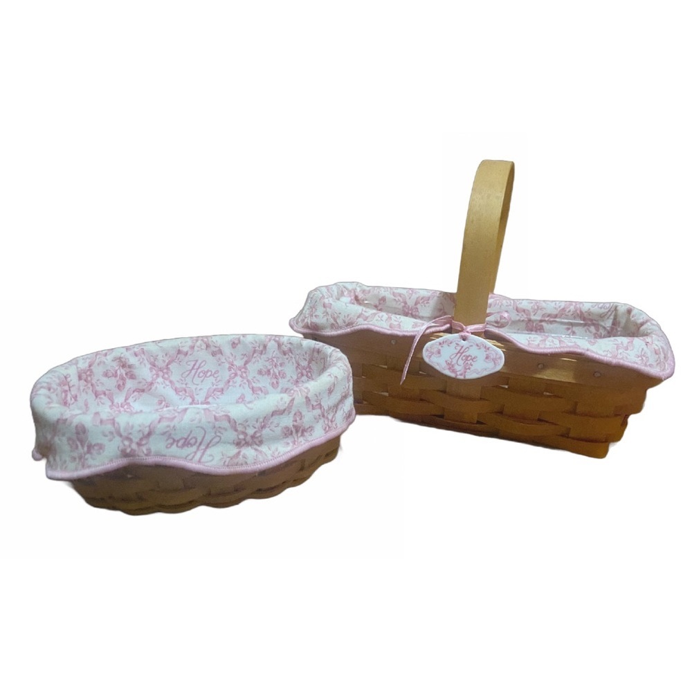 2 vintage handmade Longaberger baskets. 2003 Hope collection.Pink floral liners.